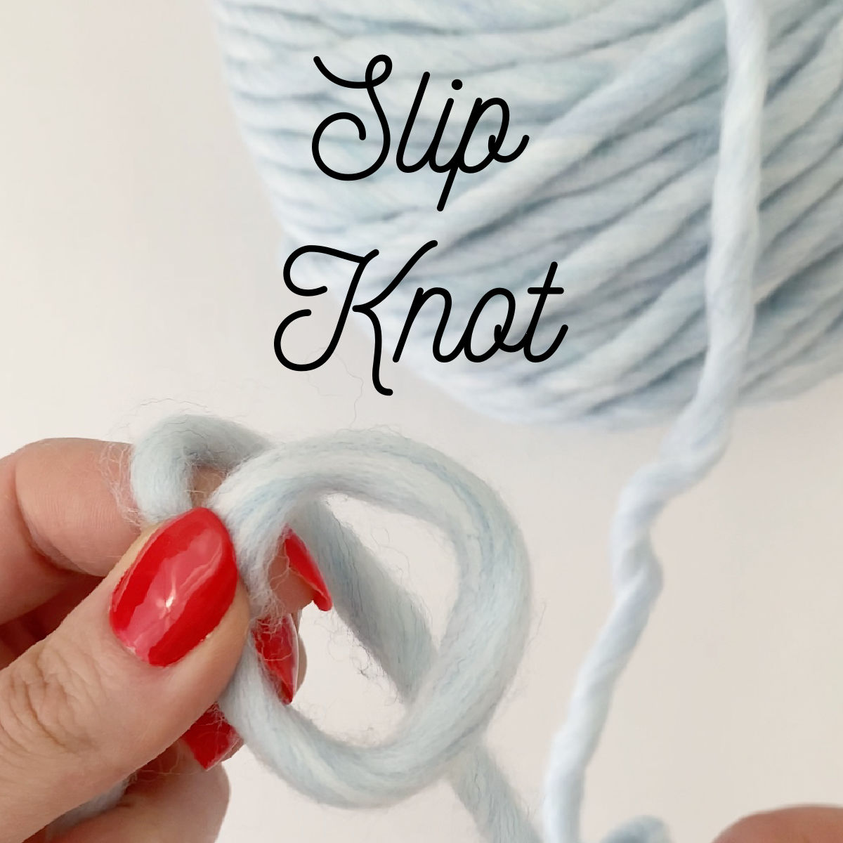 Close up of step one of slip knot